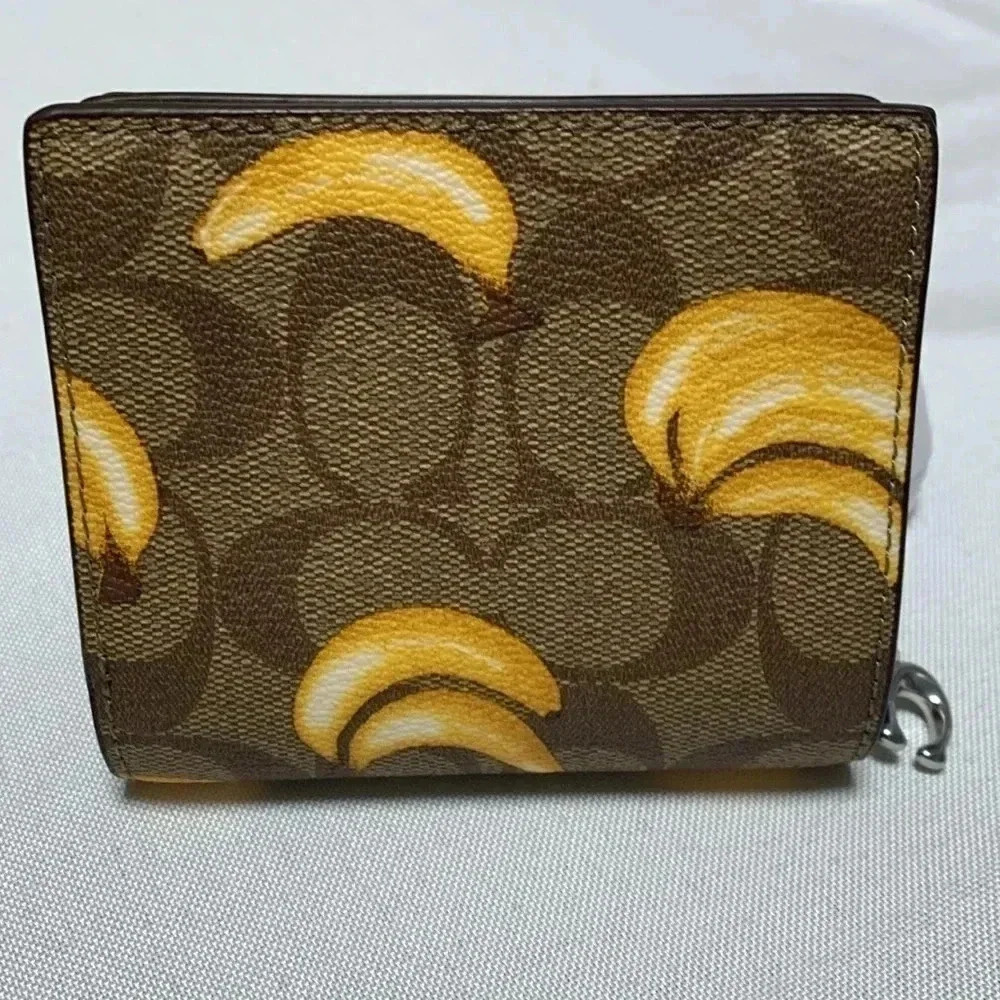COACH Snap Wallet, banana print. NWT. - Picture 2 of 5